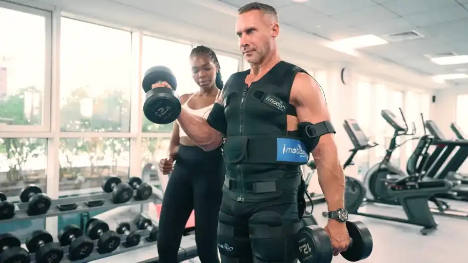 This picture shows Rozzie Kinyua training a client during an EMS session