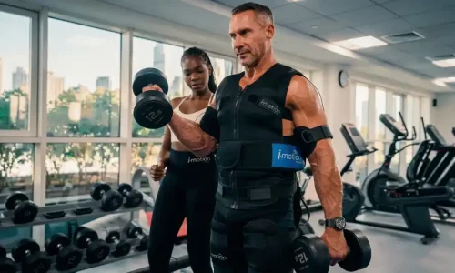 Personal trainer Rozzie Kinyua - EMS training client Dubai